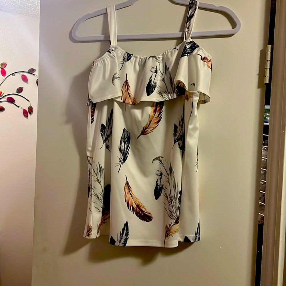 Brand new Chic Me short set, size L, cream color with feather print. Polyester